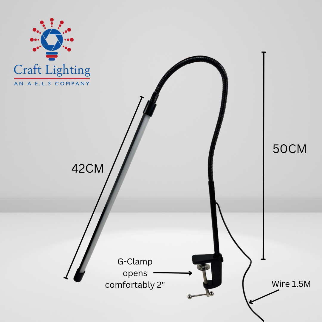 An image of a gooseneck LED light with a cord, captured in black and white, offering versatile lighting options